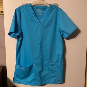 Cherokee workwear revolution top, teal color, size small